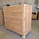Walnut chest of drawers with white marble.