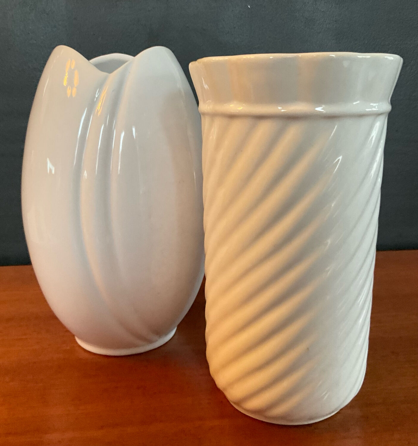 A pair of vintage ceramic vases from the 1970s.