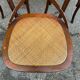 4 bistro chairs with curved wooden backs and cross braces / Crossback