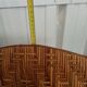 Sunbathing sunbathing in wicker rattan wood deckchair red lounger