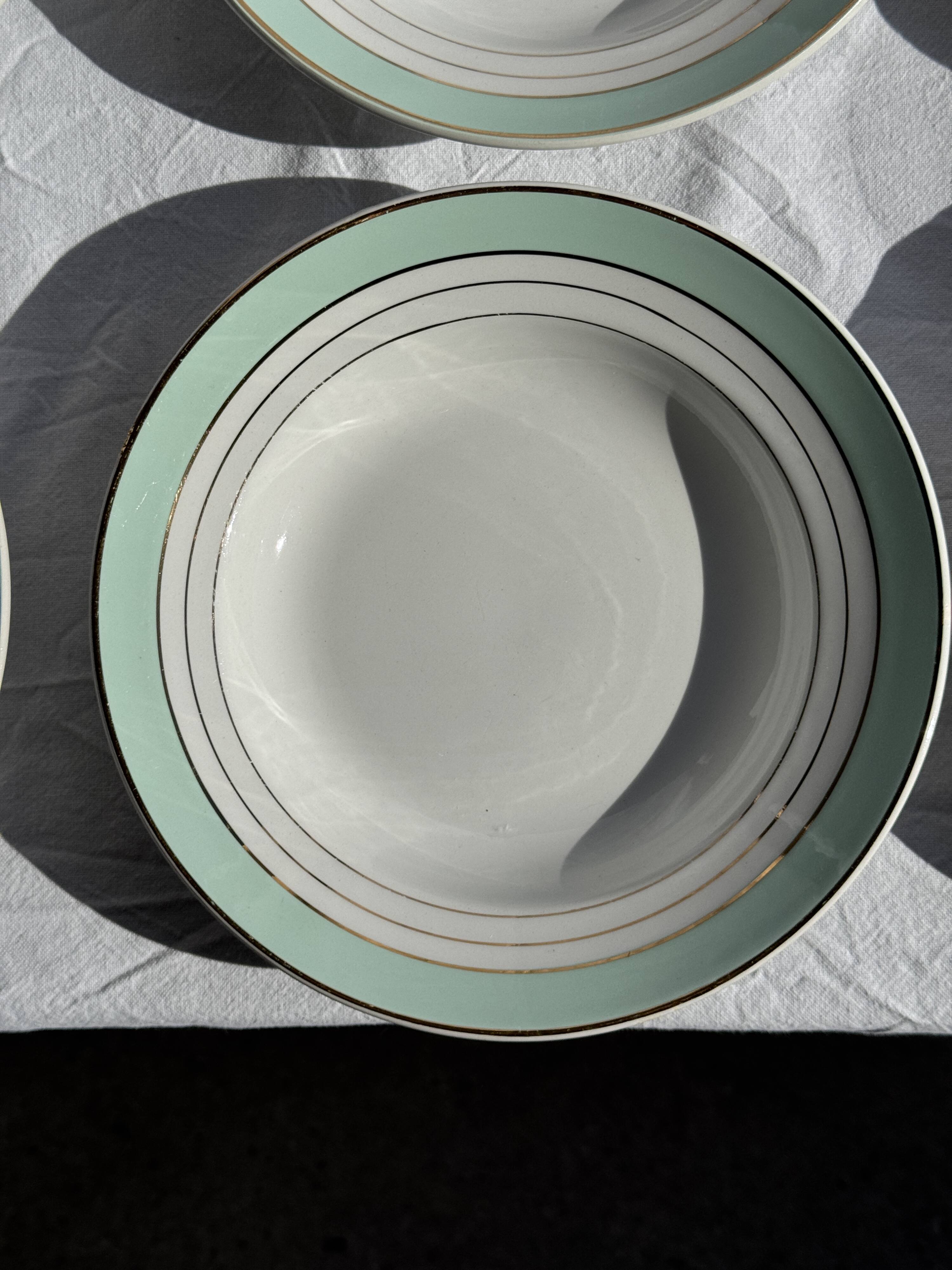 Set of 8 antique turquoise deep plates with a gold rim D22.5