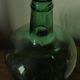 Dame Jeanne carboy from the Viresa collection in dark green glass