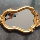 Miroir doré style louis xv.
