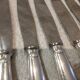 12 silver-plated table knives by Christofle Vendôme, 24.5cm