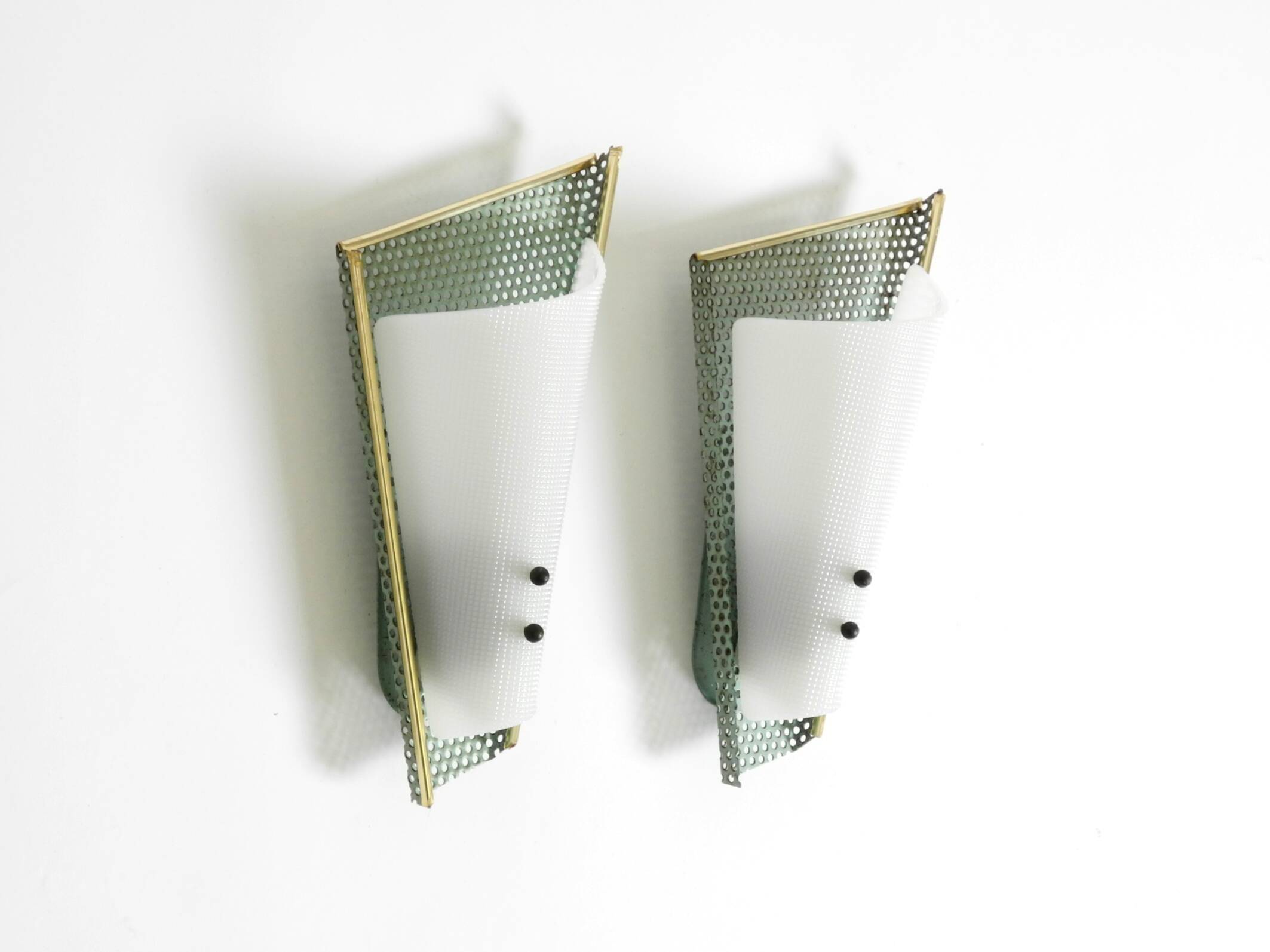 Pair of beautiful mint green Mid Century Modern perforated sheet metal wall