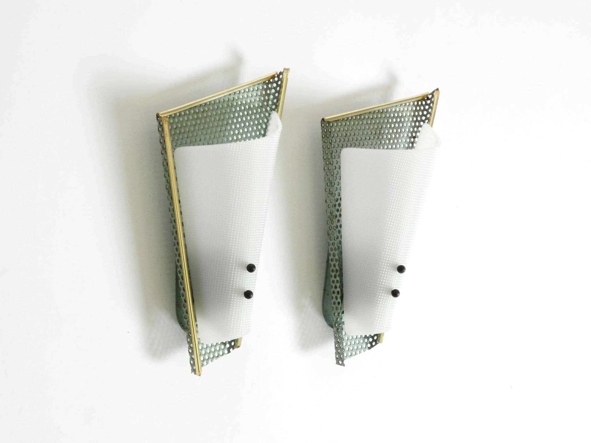 Pair of beautiful mint green Mid Century Modern perforated sheet metal wall