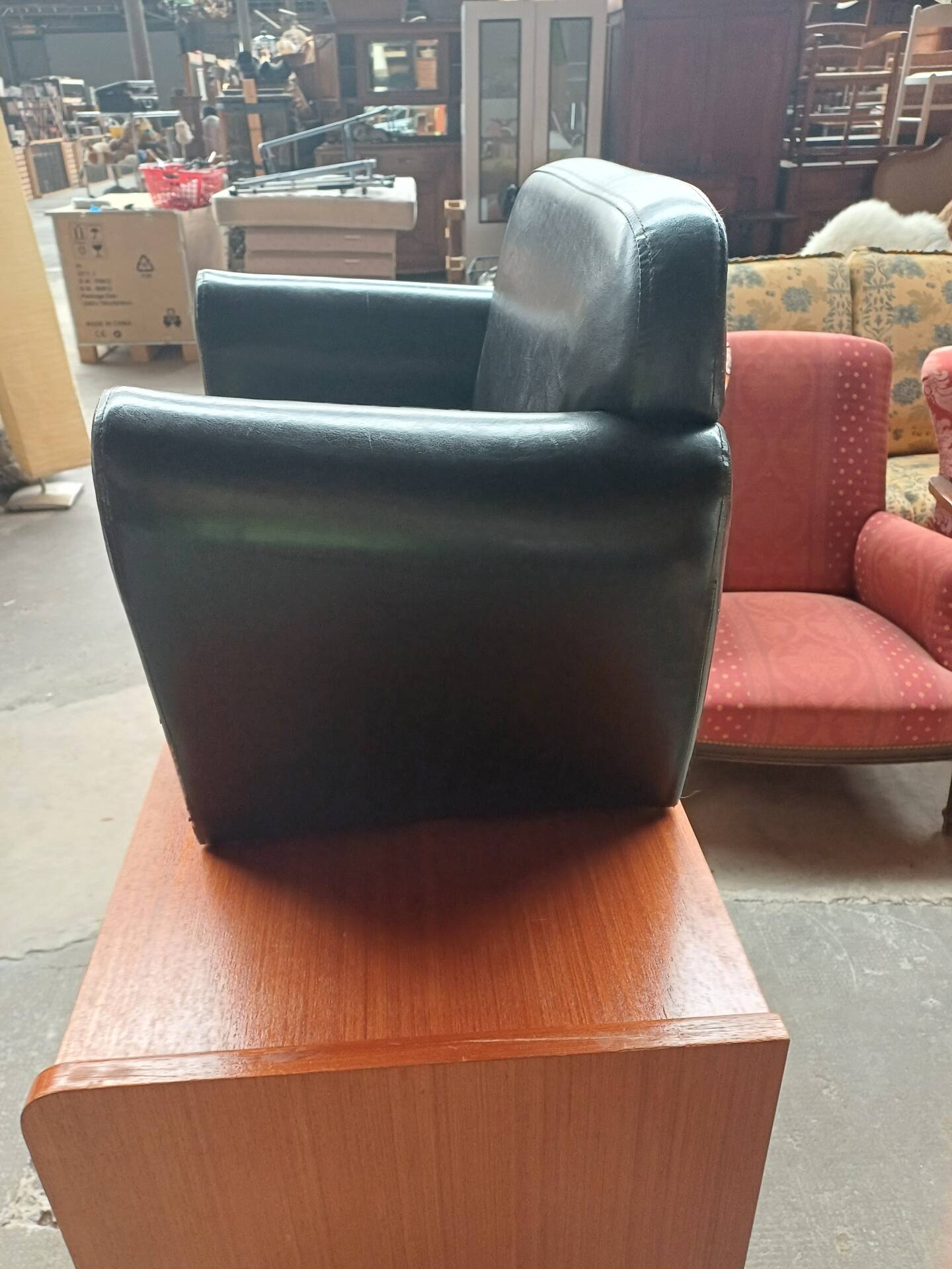 Mini black leather armchair for children