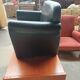 Mini black leather armchair for children