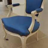 Cabriolet armchair in lacquered wood trimmed in blue satin, Louis XV style