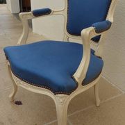 Cabriolet armchair in lacquered wood trimmed in blue satin, Louis XV style