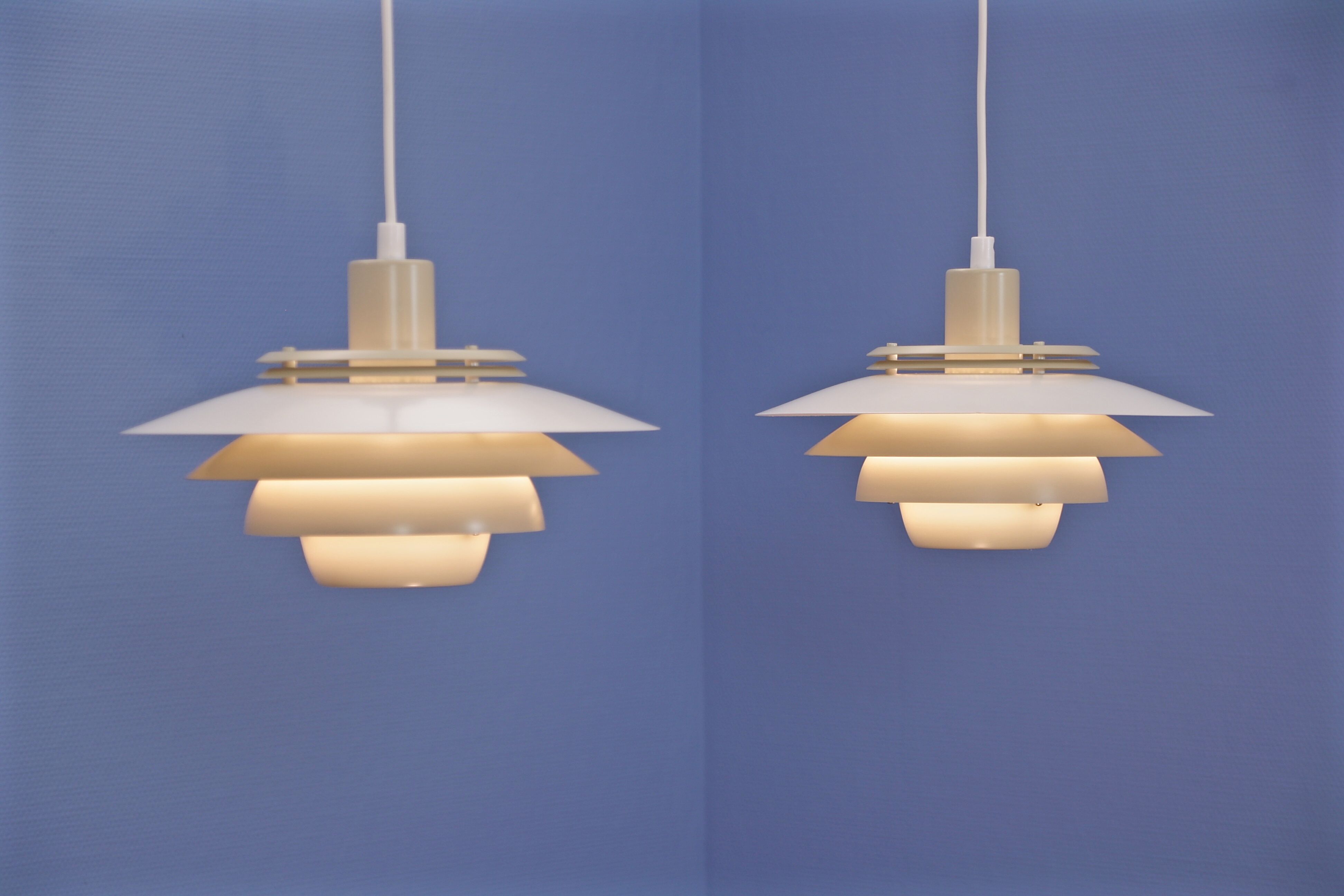Set of 2 Danish multi coloured pendants in white and beige by Jeka, 1970s
