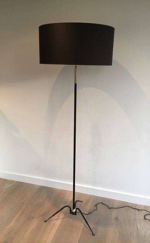 Floor lamp in black lacquered metal and brass
