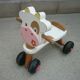 Vache porteur trotteur en bois