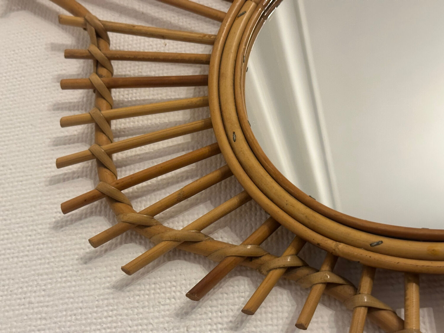 The vintage guitar rattan mirror.