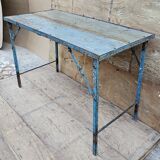 Old folding table in Burmese teak and steel