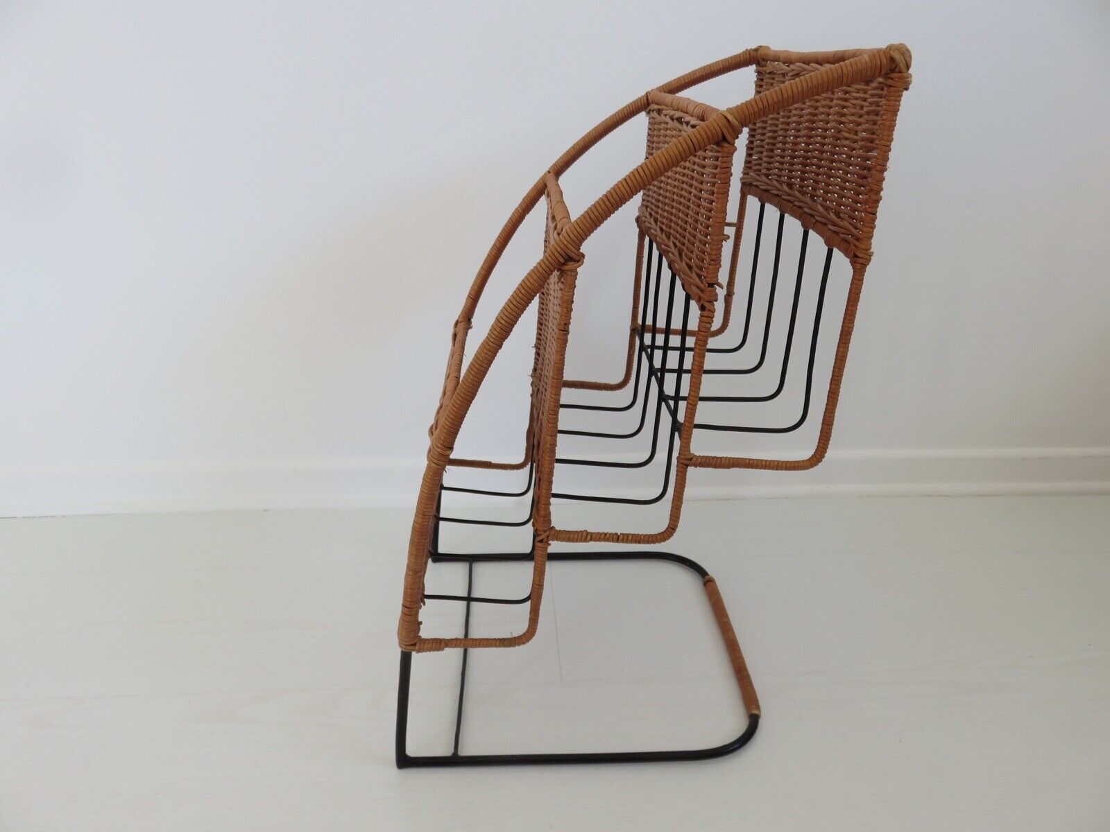 Rattan magazine door by Raoul Guys 1950