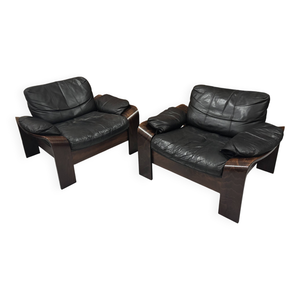 Paire de fauteuils scandinaves en cuir et palissandre