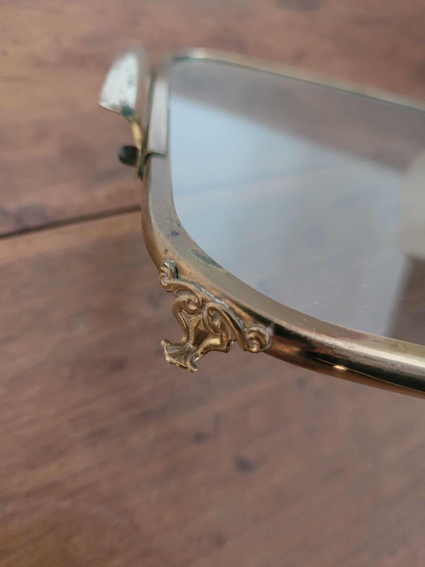 Brass glass plateau from the early 20th century.
