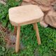 Antique stool in raw wood