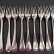 Lot de 9 fourchettes Christofle en métal argenté
