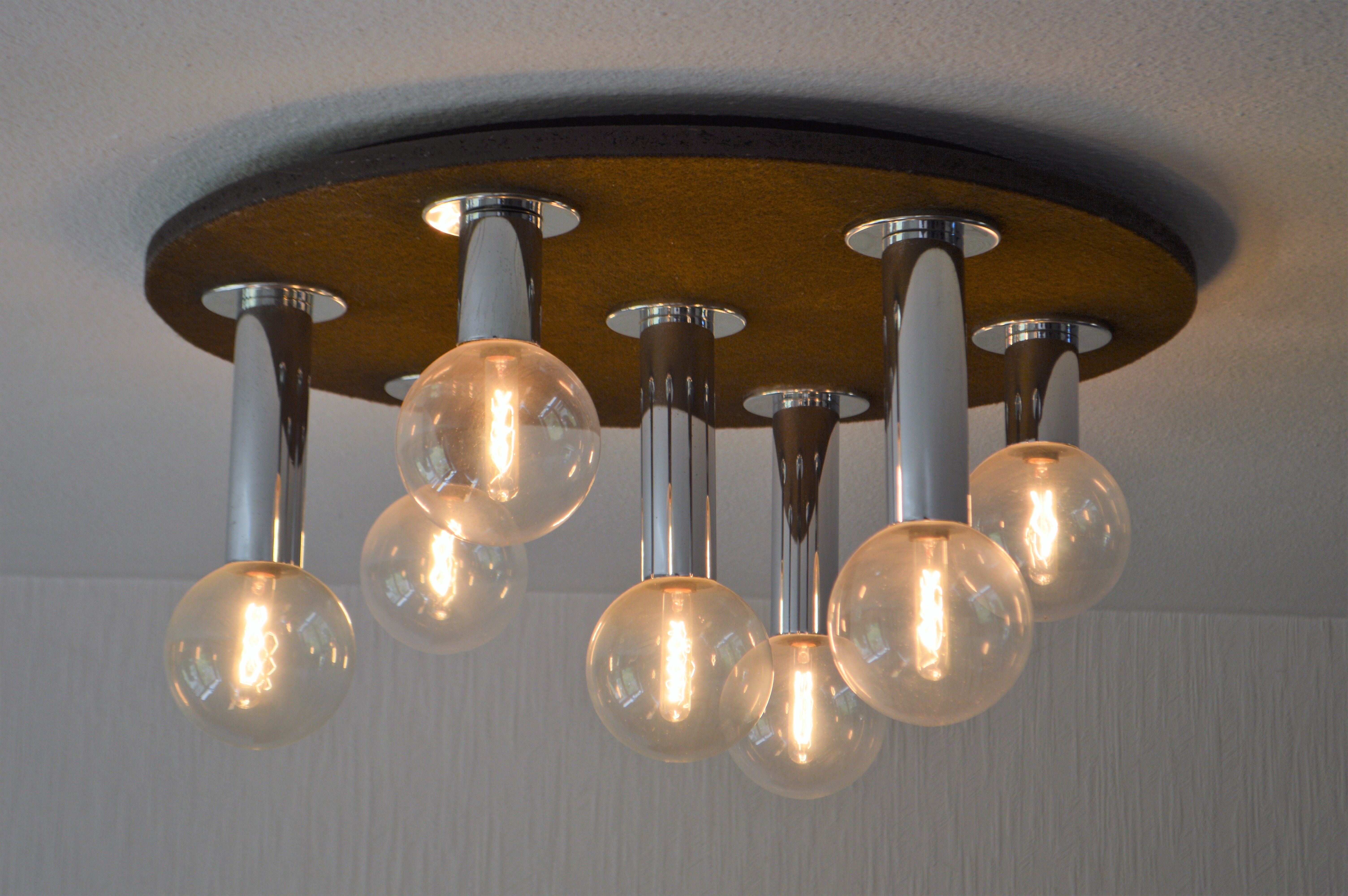 Vintage lamp of the 70s design in chrome glass space age