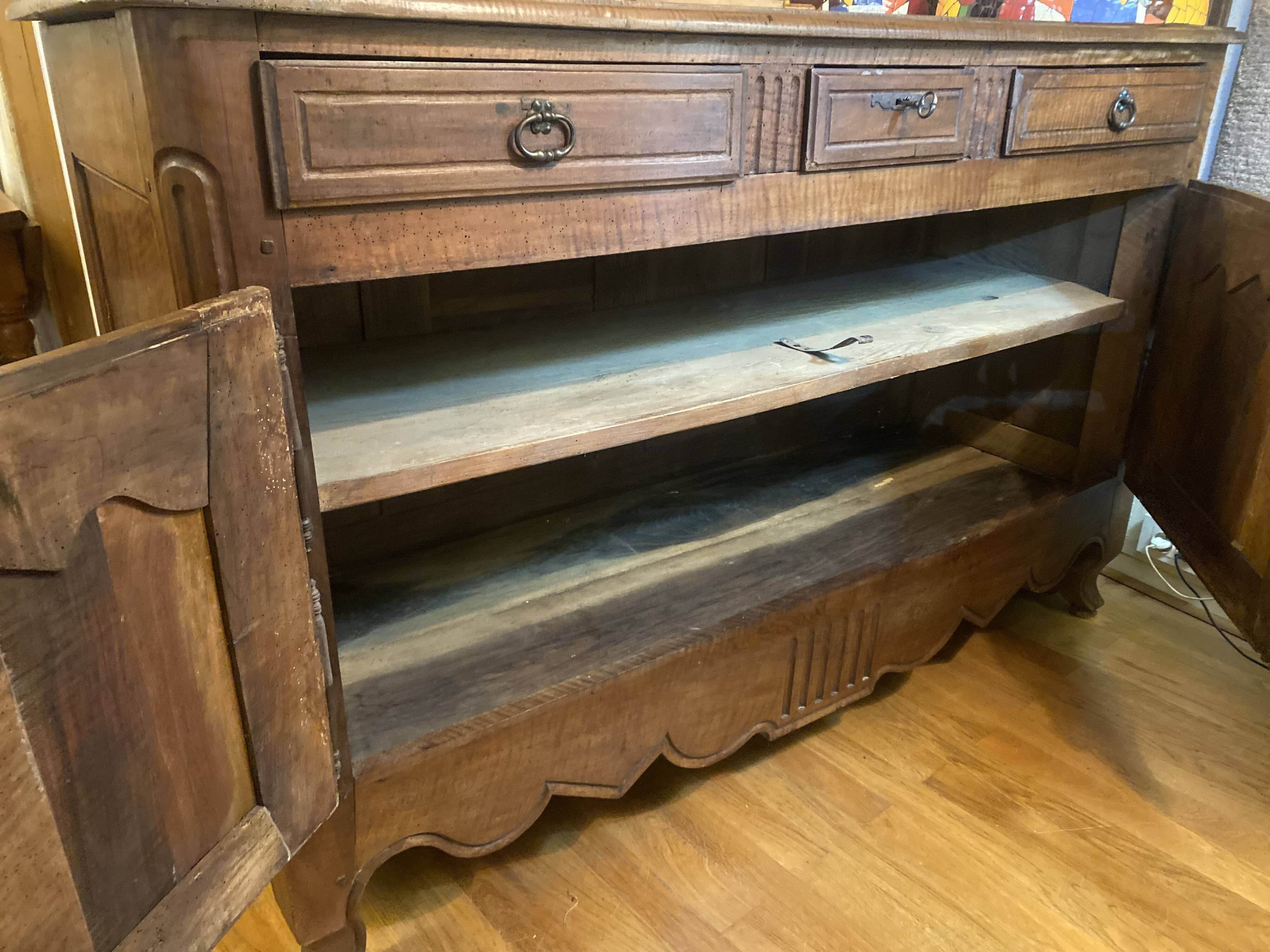 Important Louis XV style walnut sideboard.