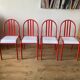 4 red metal chairs by Mallet-Stevens