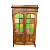 Liège bookcase in carved oak Regency style