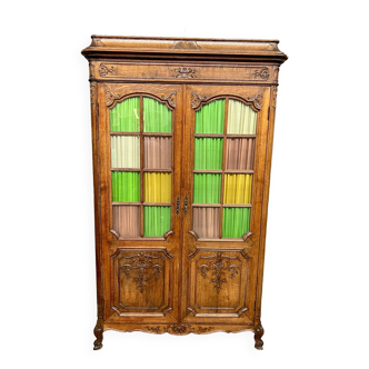 Liège bookcase in carved oak Regency style