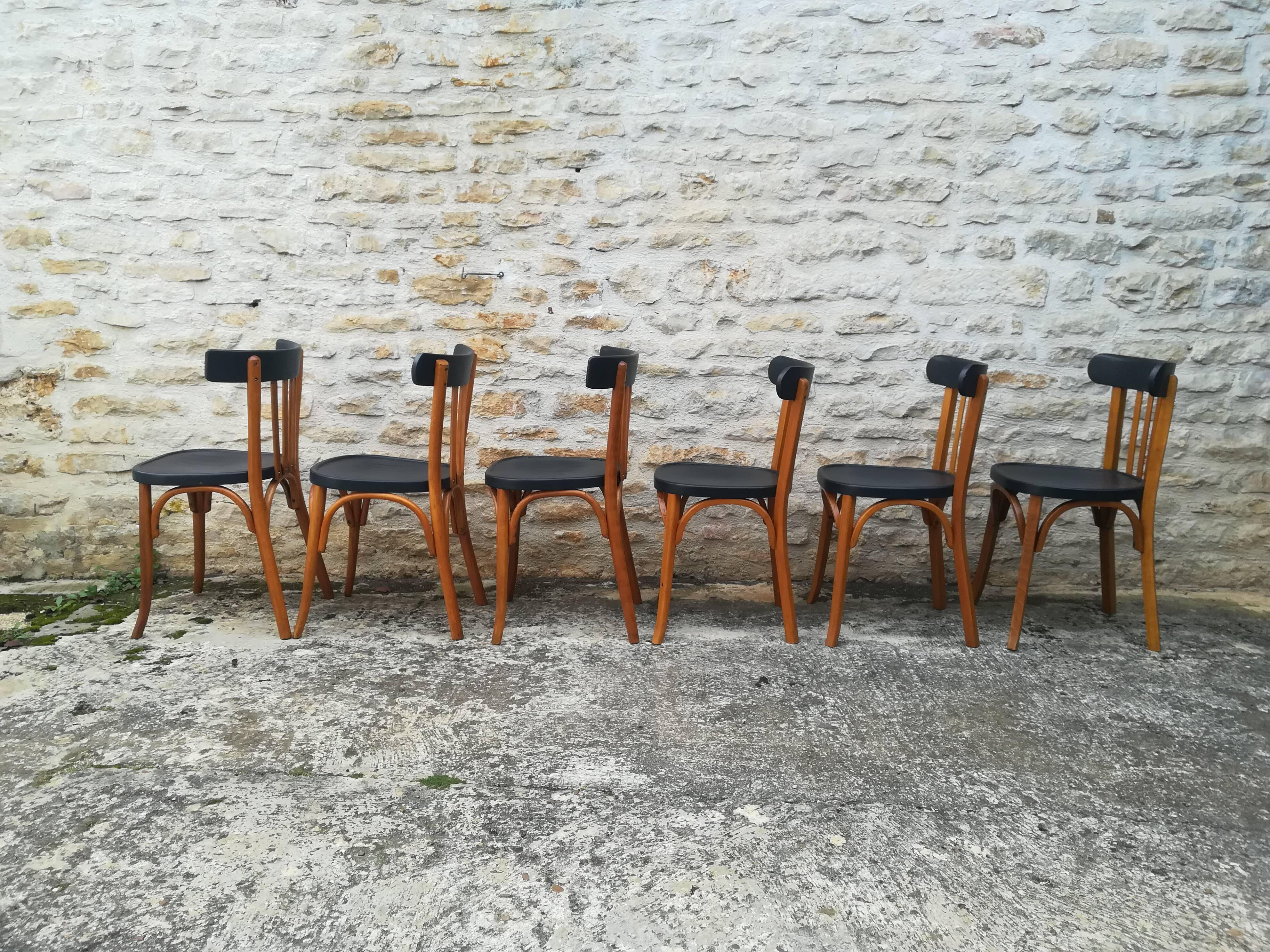 12 mismatched bistro chairs