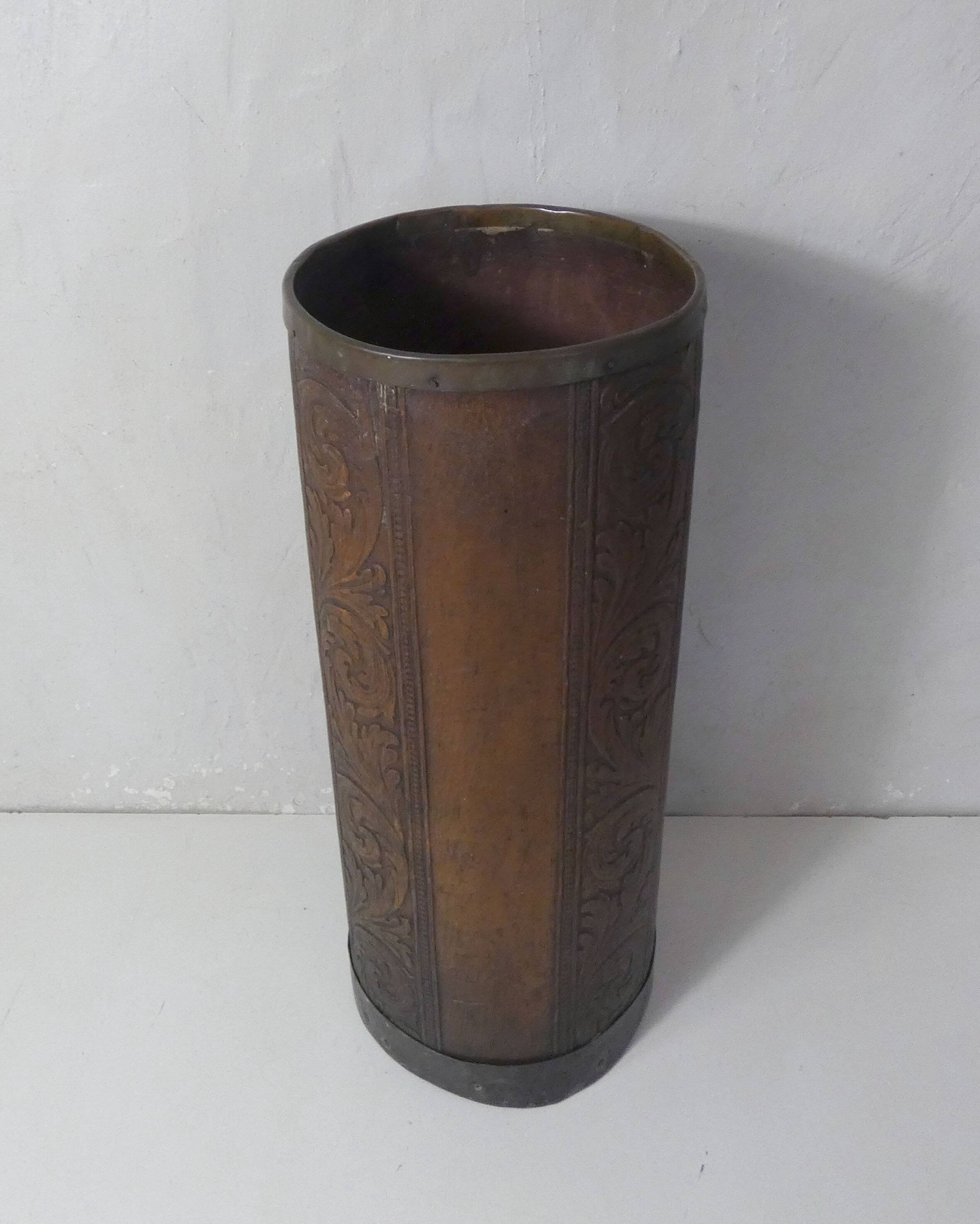 old carved wooden umbrella stand