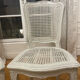 Set of 4 white caned chairs in Louis XV style.