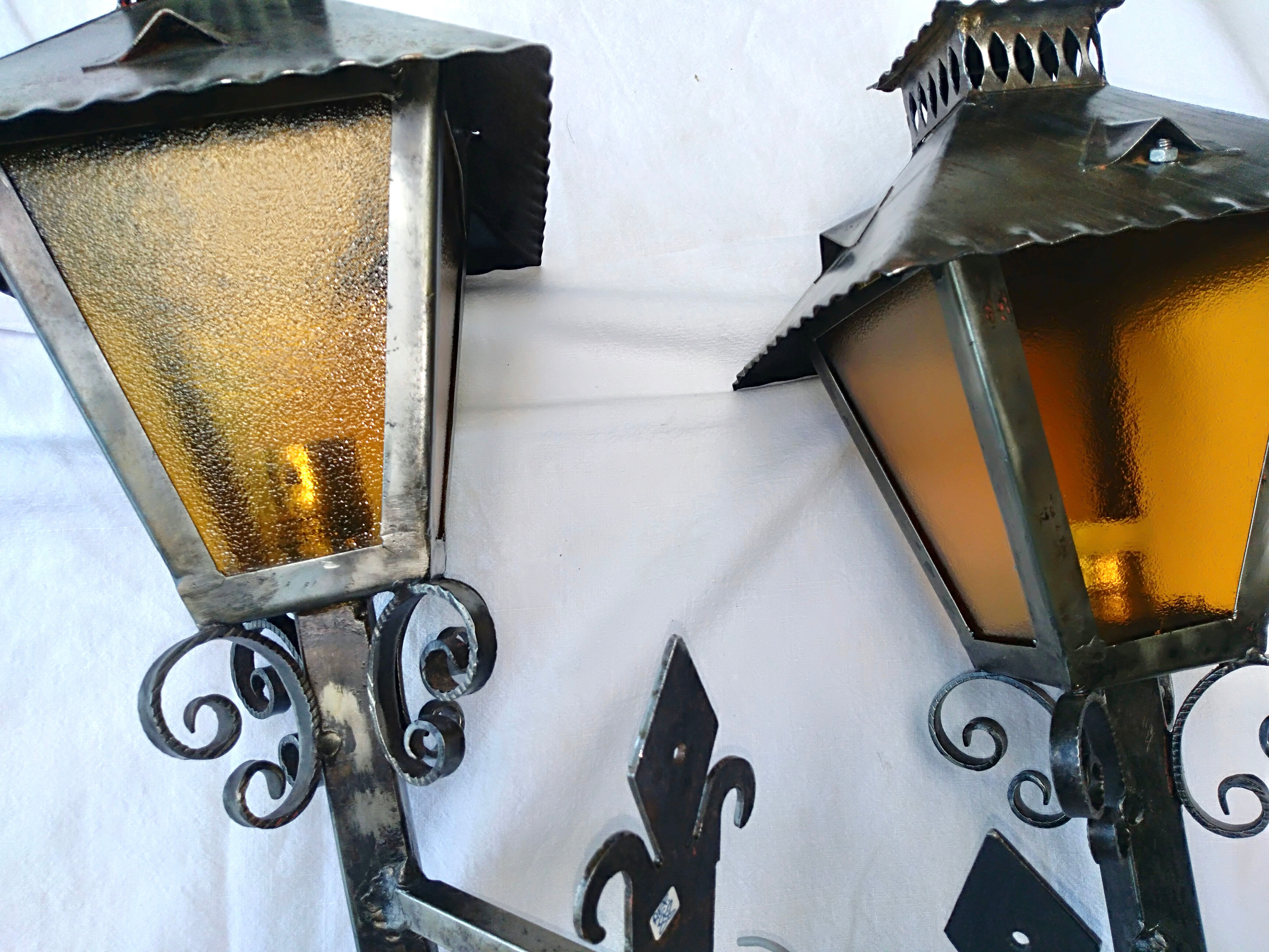 Pair of large metal sconces