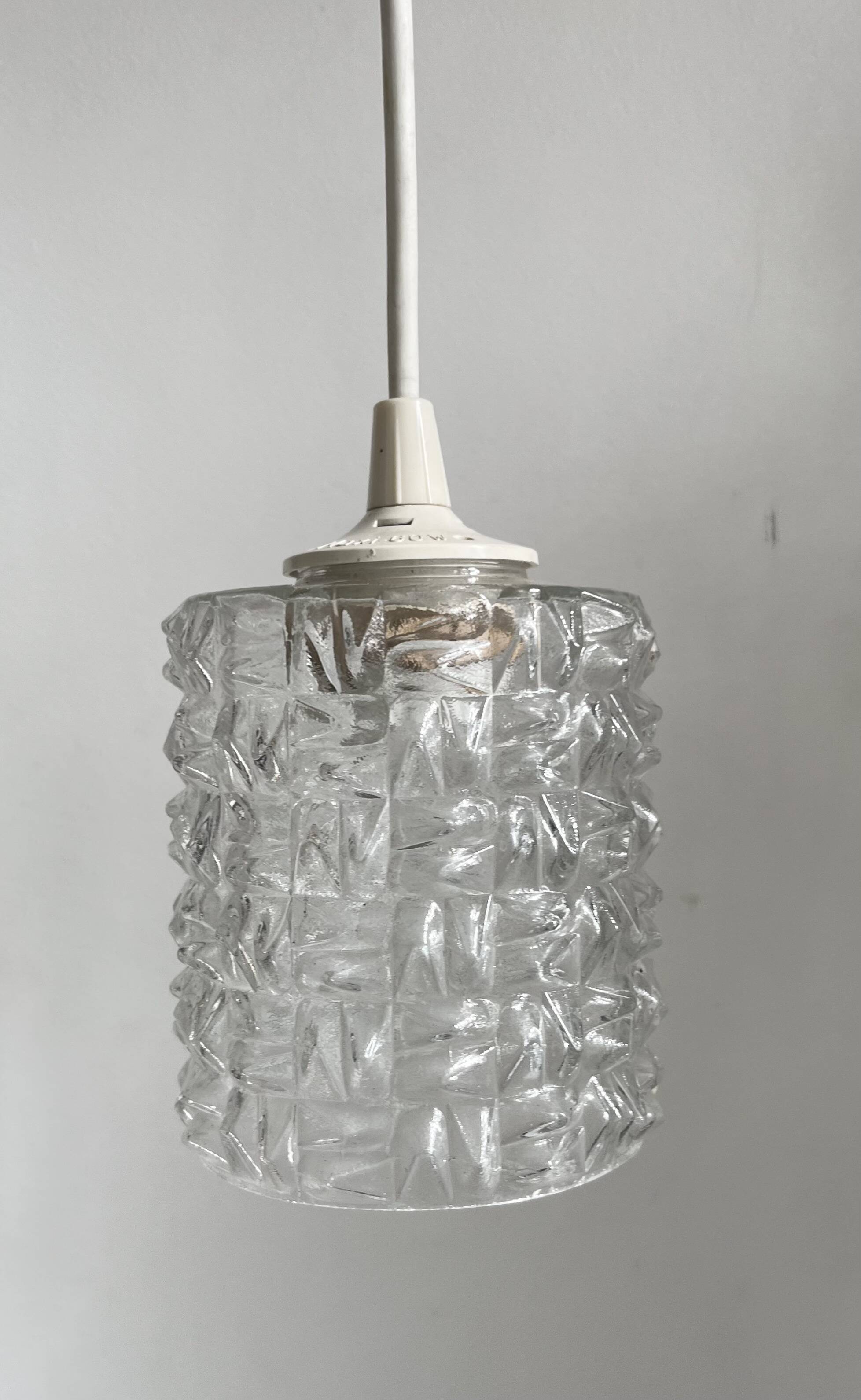 Small cylindrical molded glass pendant light