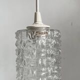Small cylindrical molded glass pendant light