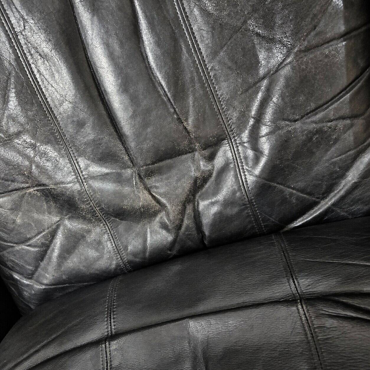 Paire de fauteuils scandinaves en cuir et palissandre