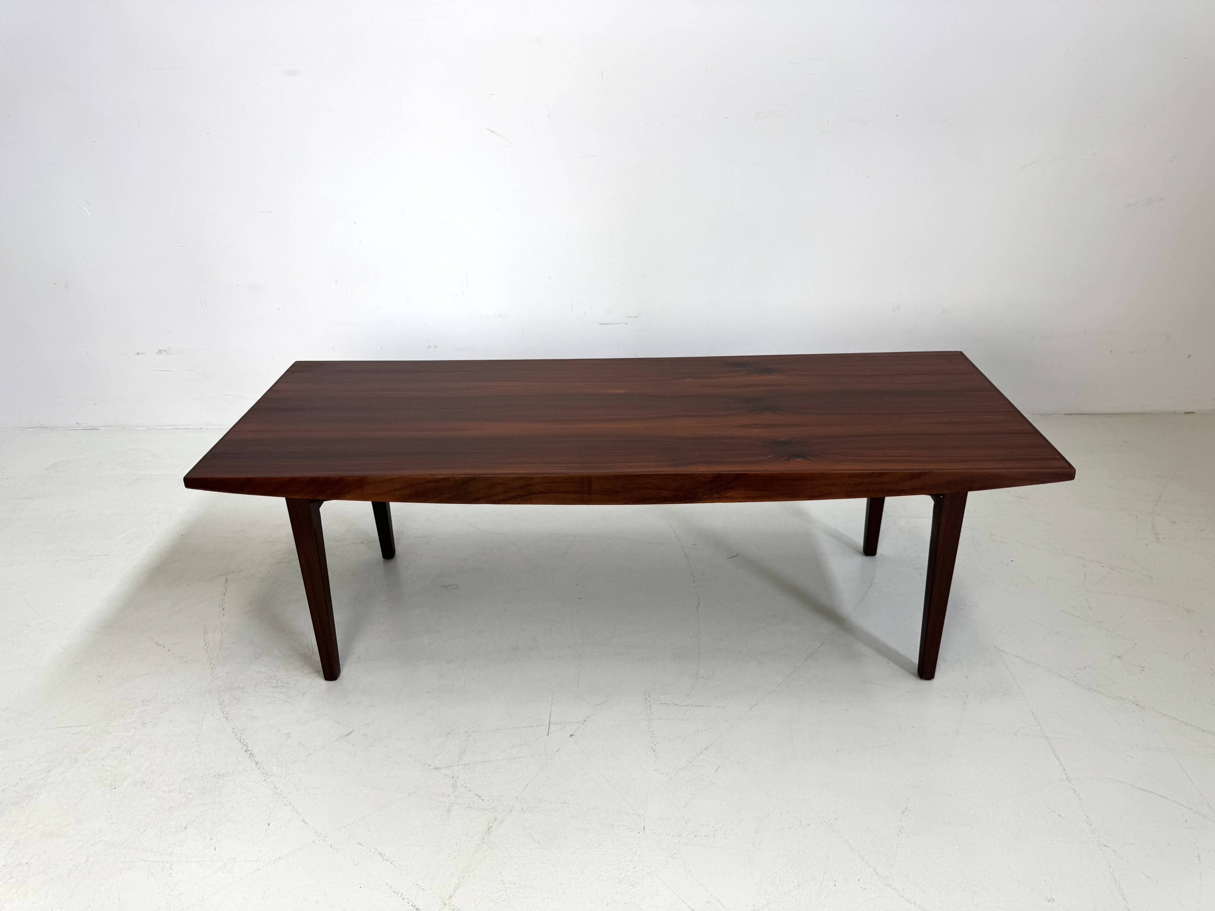 Beautiful compact design coffee table made of rosewood from the 1960s.