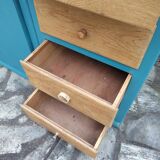 Asymmetrical changing table cabinet