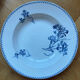 Deep plates Sarreguemines with carnation bouquets