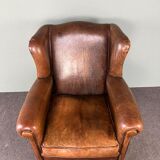 Vintage armchair in patinated sheep leather