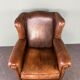 Fauteuil vintage en cuir de mouton patiné