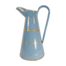 Old jug or water pitcher in blue and gold enamelled sheet metal