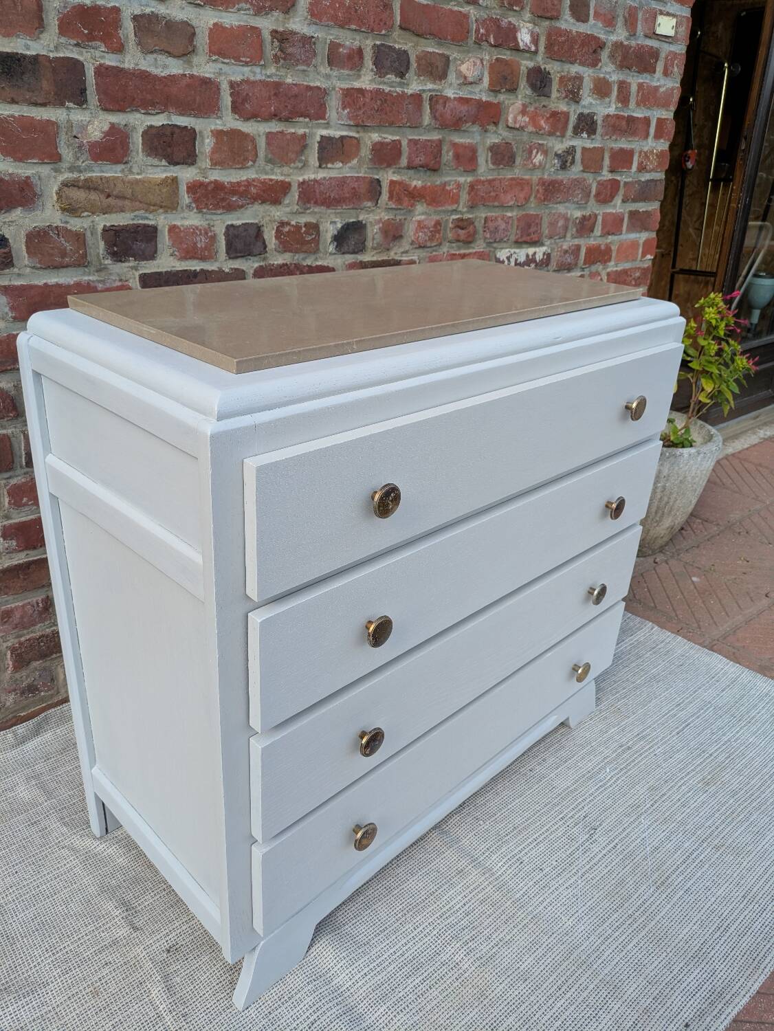 Marble-topped chest of drawers