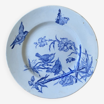 Plate decorated with blue birds and butterflies