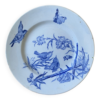 Plate decorated with blue birds and butterflies
