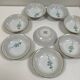 Vintage porcelain service: salad bowl and 8 small bowls.