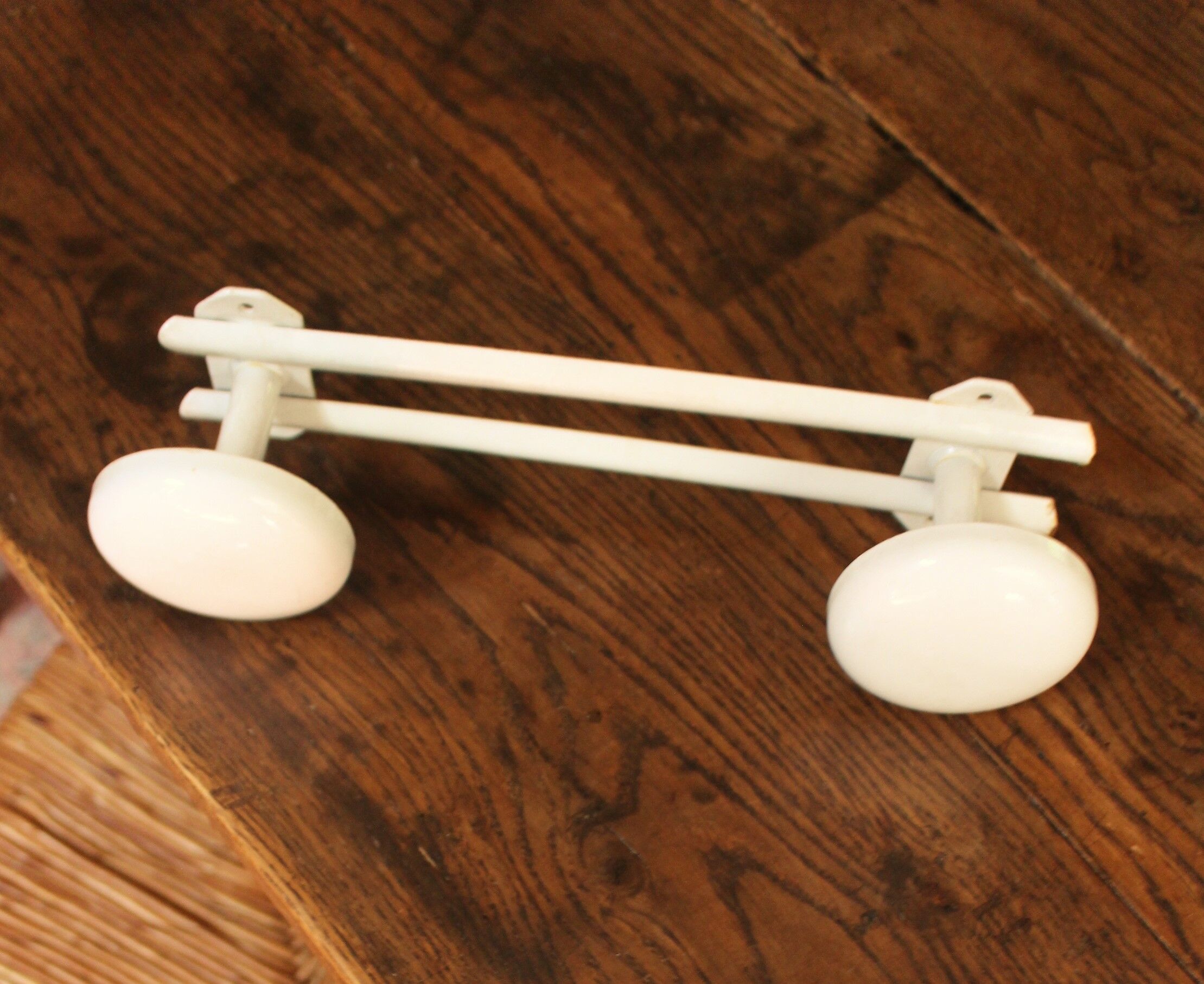 Vintage white metal coat rack with 2 hooks