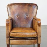 Fauteuil unique en cuir de mouton ancien