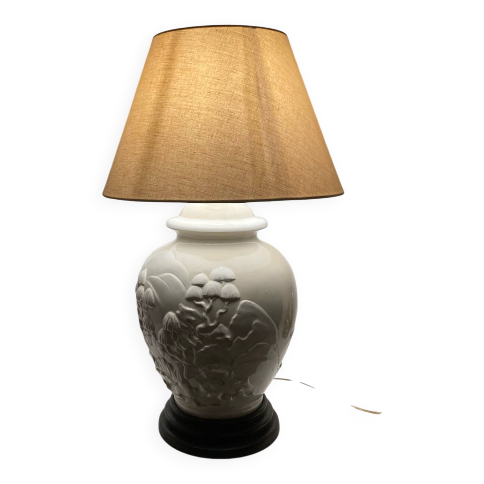 1980s ceramic table lamp with a wooden base and adjustable shade.