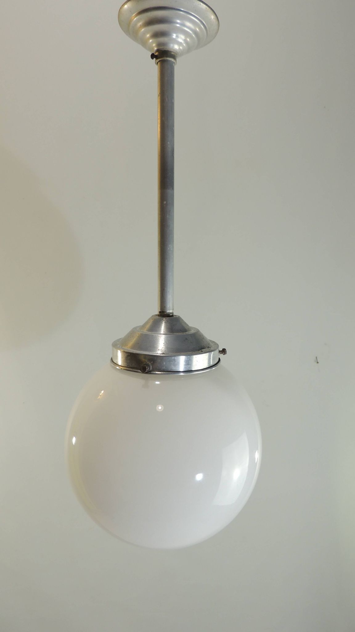 Vintage suspension in aluminum metal and opaline glass globe – Industrial design